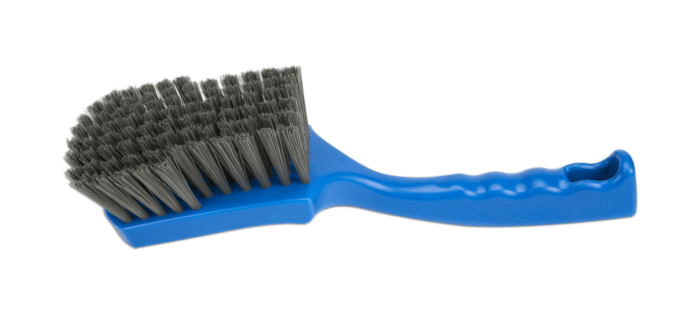 A side view of a single blue metal detectable churn brush with metal detectable bristles