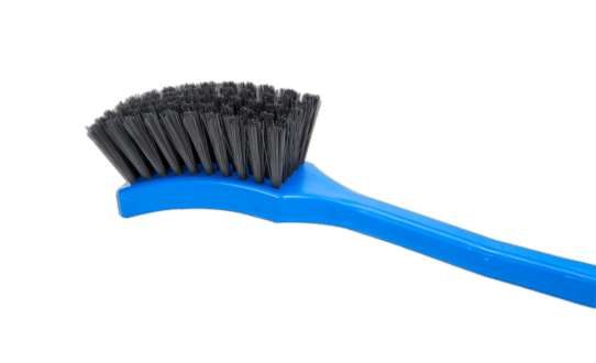 A close up view of a single blue Metal Detectable Utility Brush with Metal Detectable Bristles